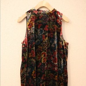 Short velvet dress, warm greens, reds, and purples